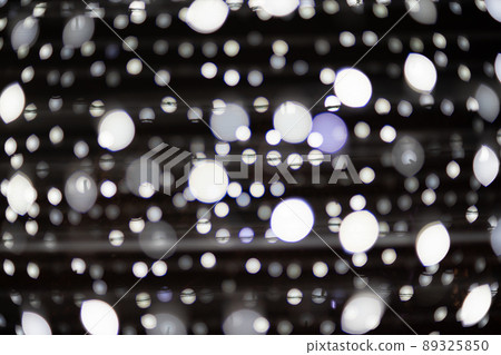 Christmas ilumination bokeh gights in the city Christmas ilumination bokeh gights in the city 89325850