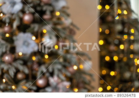 Decorated Christmas tree on blurred, sparkling and fairy background Decorated Christmas tree on blurred, sparkling and fairy background 89326478