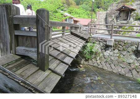 A wooden bridge over the streets of Iwami Ginzan, a World Heritage Site A wooden bridge over the streets of Iwami Ginzan, a World Heritage Site 89327148