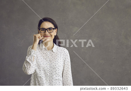 Young caucasian woman closing zip on lips showing keeping secrete gesture 89332643