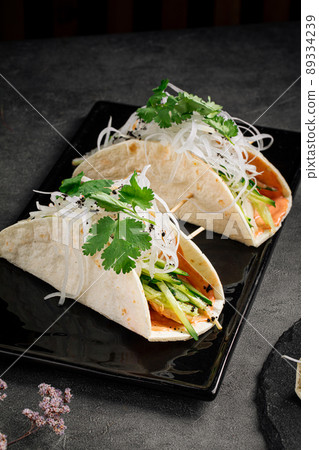 Tacos filled with different filling 89334239