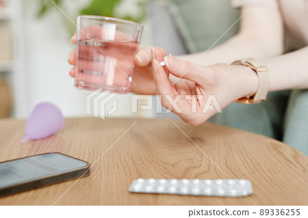 Woman Taking Birth Control Closeup 89336255