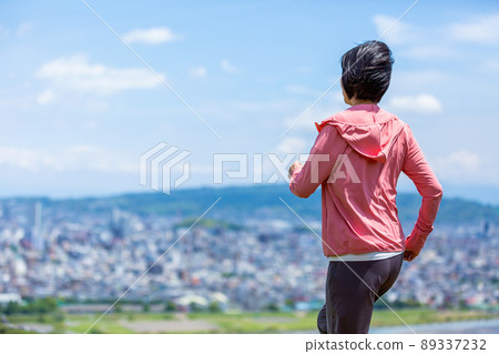 Japanese middle-aged woman exercising outdoors 89337232