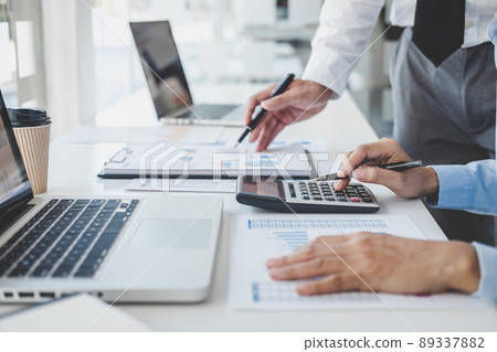 Teamwork of business colleagues consultation market growth on financial document graph report statistics, professional occupation working analyzing investment project to development grow to success Teamwork of business colleagues consultation market growth on financial document graph report statistics, professional occupation working analyzing investment project to development grow to success 89337882