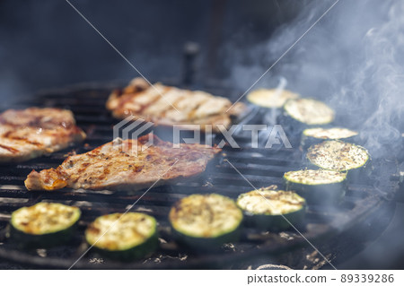 pork and zucchini, garden grill with charcoal 89339286