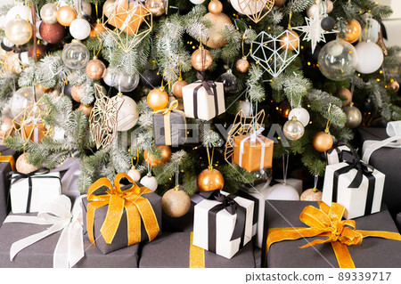 Christmas tree decoration close up background. Garland, balls, illuminated lights Christmas tree decoration close up background. Garland, balls, illuminated lights 89339717