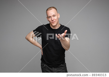 strong caucasian man with short fair hair wearing strong caucasian man with short fair hair wearing 89340313