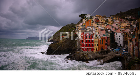 Colorful houses of Riomaggiore at the Italian west coast - Cinque Terre 89340583