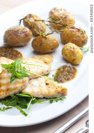 grilled fish with grilled potatoes grilled fish with grilled potatoes 89340603
