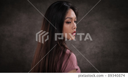 Young pretty woman in profile - portrait shot Young pretty woman in profile - portrait shot 89340874