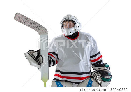 Half-length portrait of boy, child, hockey player in uniform of goalkeeper posing isolated over white studio backgrund 89340881