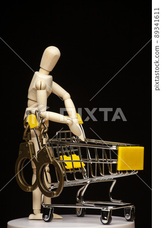 image of empty trolley handcuffs wooden figure dark background image of empty trolley handcuffs wooden figure dark background 89341611
