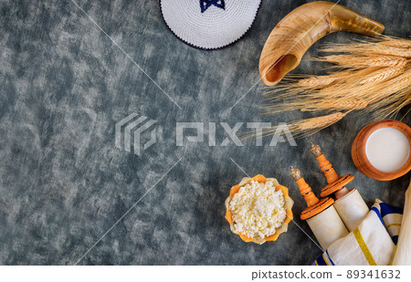 Jewish holiday Shavuot concept in the kosher dairy food on harvest season 89341632