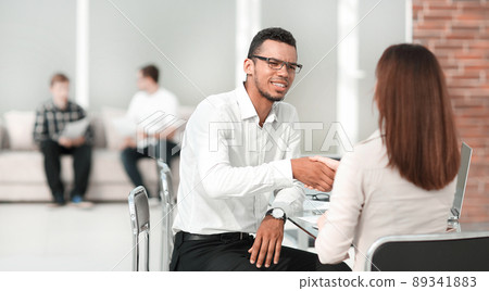 handshake of business people in the Bank office. handshake of business people in the Bank office. 89341883