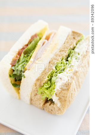 Delicious ham cheese sandwich and tuna sandwich 89342096