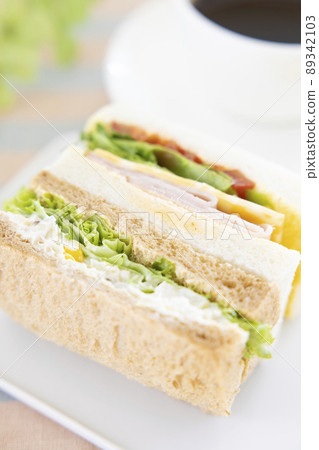 Delicious ham cheese sandwich, tuna sandwich and hot coffee 89342103