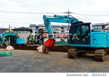 Construction site heavy equipment backhoe 89343293