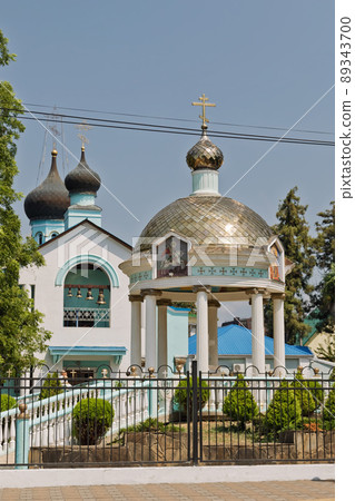 View of the rotunda of Holy-water on the square at the Holy Trinity Church in Sochi View of the rotunda of Holy-water on the square at the Holy Trinity Church in Sochi 89343700