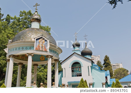 View of the rotunda of Holy-water on the square at the Holy Trinity Church in Sochi View of the rotunda of Holy-water on the square at the Holy Trinity Church in Sochi 89343701