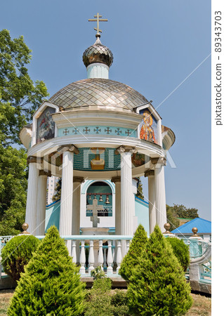 View of the rotunda of Holy-water on the square at the Holy Trinity Church in Sochi View of the rotunda of Holy-water on the square at the Holy Trinity Church in Sochi 89343703