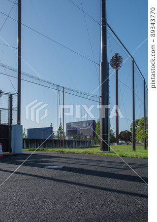 Baseball field and scoreboard on a sunny day 89343770