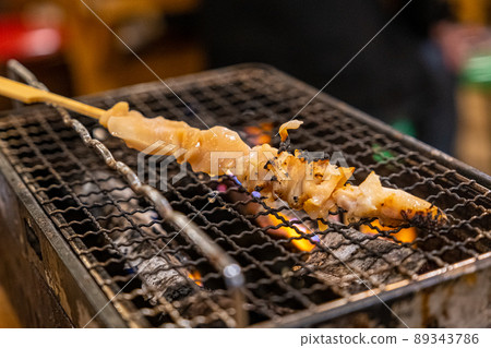 Grilled seashell skewers 05 89343786