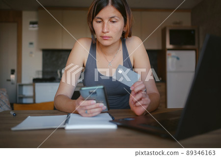 young asian woman at home, remote work 89346163
