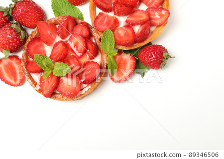 Delicious strawberry tarts isolated on white background Delicious strawberry tarts isolated on white background 89346506