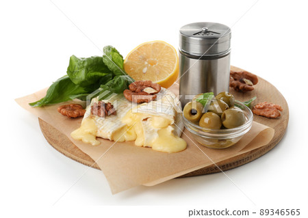 Concept of tasty food with grilled camembert isolated on white background Concept of tasty food with grilled camembert isolated on white background 89346565