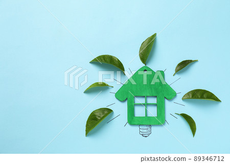 Concept of green electricity on blue background Concept of green electricity on blue background 89346712