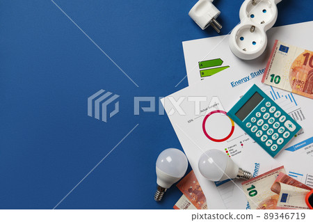 Concept of energy saving on blue background Concept of energy saving on blue background 89346719