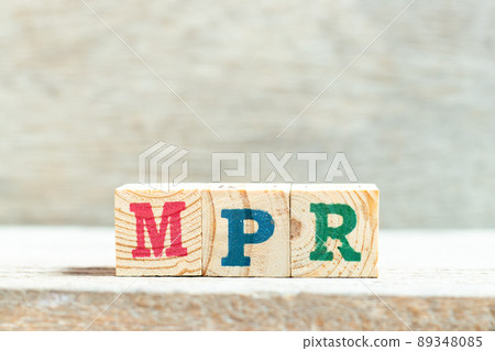 Alphabet letter block in word MPR (Abbreviation of Market price referent or Monthly progress report) on wood background 89348085