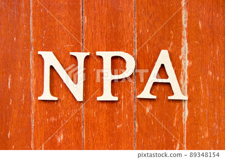 Alphabet letter in word NPA (Abbreviation of Non performing assets or Nasopharyngeal airway) on old red color wood plate background Alphabet letter in word NPA (Abbreviation of Non performing assets or Nasopharyngeal airway) on old red color wood plate background 89348154
