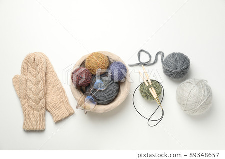 Concept of knitting on white background, top view Concept of knitting on white background, top view 89348657