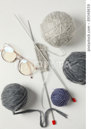 Concept of knitting on white background, top view Concept of knitting on white background, top view 89348659