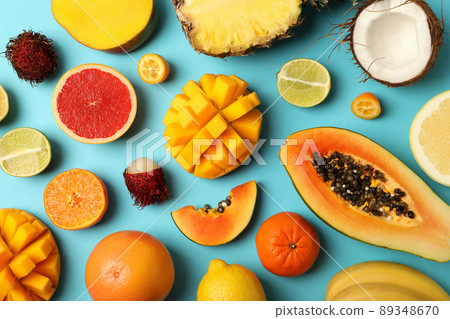 Exotic fruits set on blue background, top view 89348670