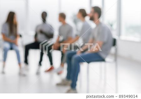 background image of a group of young people sitting in a circle background image of a group of young people sitting in a circle 89349014