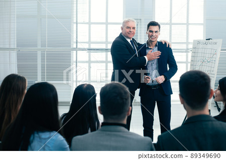 business partners standing together in a conference room 89349690