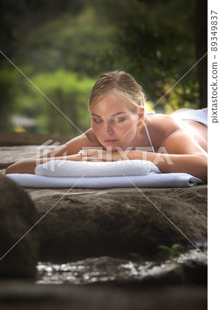 beautiful woman in spa environment 89349837