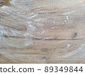 White flour on wooden table. Free space for text. 89349844