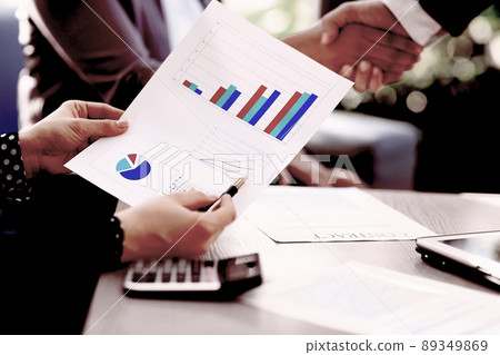 close up. businessman checks the financial profit of the new deal close up. businessman checks the financial profit of the new deal 89349869