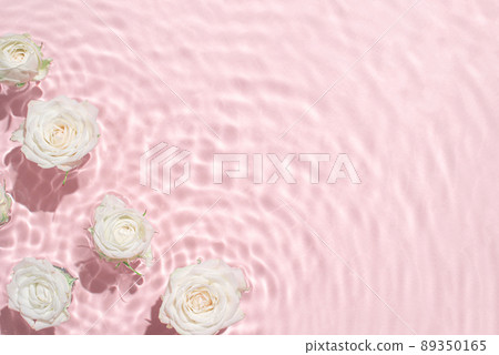 Sunny summer cosmetic background with flowers. The texture of the water surface. Sunny summer cosmetic background with flowers. The texture of the water surface. 89350165