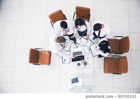 professional business team developing a new financial strategy of the company at a work location in a modern office professional business team developing a new financial strategy of the company at a work location in a modern office 89350241