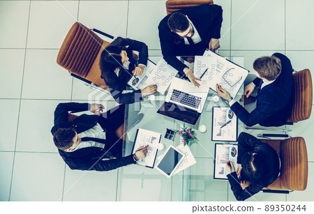 business team discussing the company's financial plan for a mode 89350244