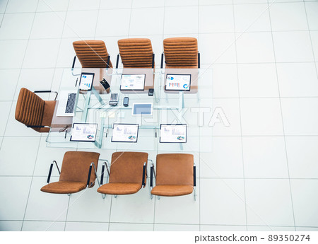 chairs and Desk with documents and laptop for negotiations with business partners chairs and Desk with documents and laptop for negotiations with business partners 89350274