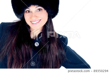 beautiful young woman in winter clothes.isolated on white 89350294