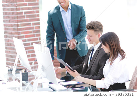 business team working with documents in a modern office. 89350351