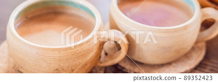 Homemade Indian Sweet masala tea. Spices - cardamom, cinnamon, ginger BANNER, LONG FORMAT 89352423