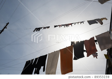 Clothes hanging on line in the street of Tbilisi Georgia 89353159