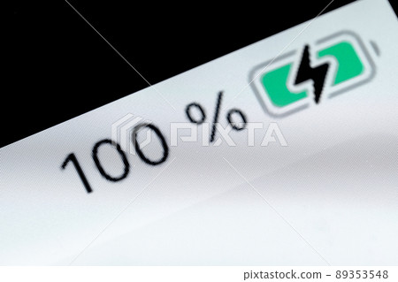 Smartphone full charged battery level indicator - 100 percent: close up macro Smartphone full charged battery level indicator - 100 percent: close up macro 89353548